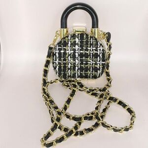 Elegant Black and Gold Tweed Handbag